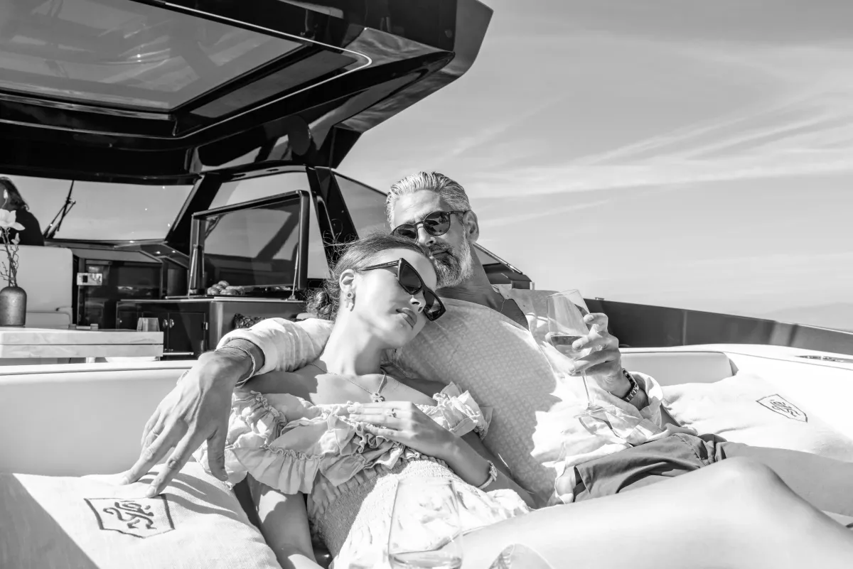 Owners relaxing on the aft sun bed of a Bekkers AZUR 45HT