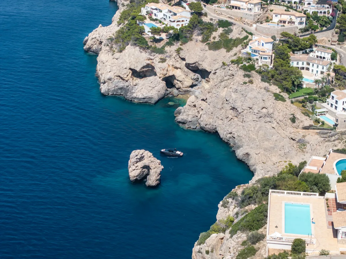 AZUR 45HT anchored beside a rock off the Mallorca coast