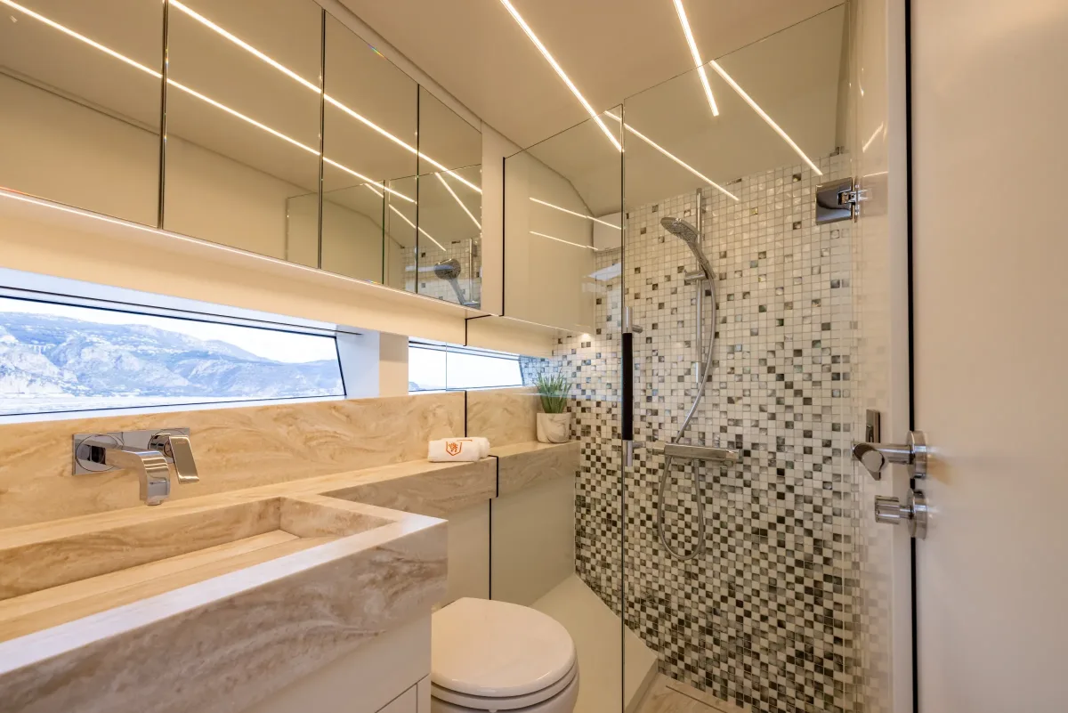 Bathroom with marble basin and mother-of-pearl shower