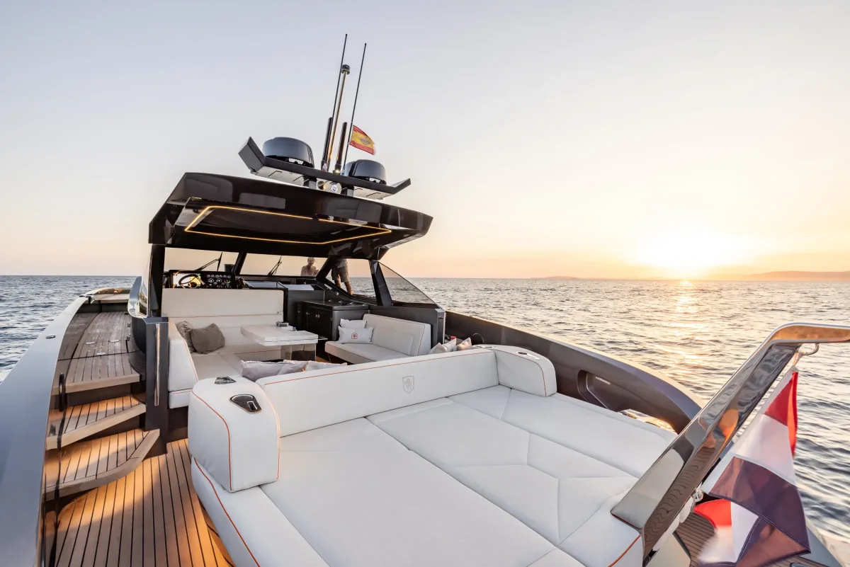 Aft sun pad and cockpit at sunset